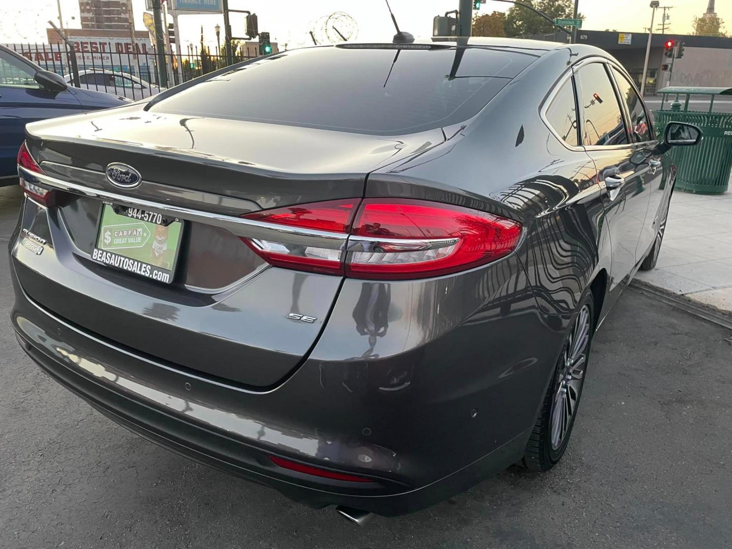 2018 GRAY /BLACK Ford Fusion Energi SE (3FA6P0PU1JR) with an 4-Cyl, Hybrid, 2.0 Liter engine, Automatic, CVT transmission, located at 744 E Miner Ave, Stockton, CA, 95202, (209) 944-5770, 37.956863, -121.282082 - PLUS TAXES AND FEES - Photo#6